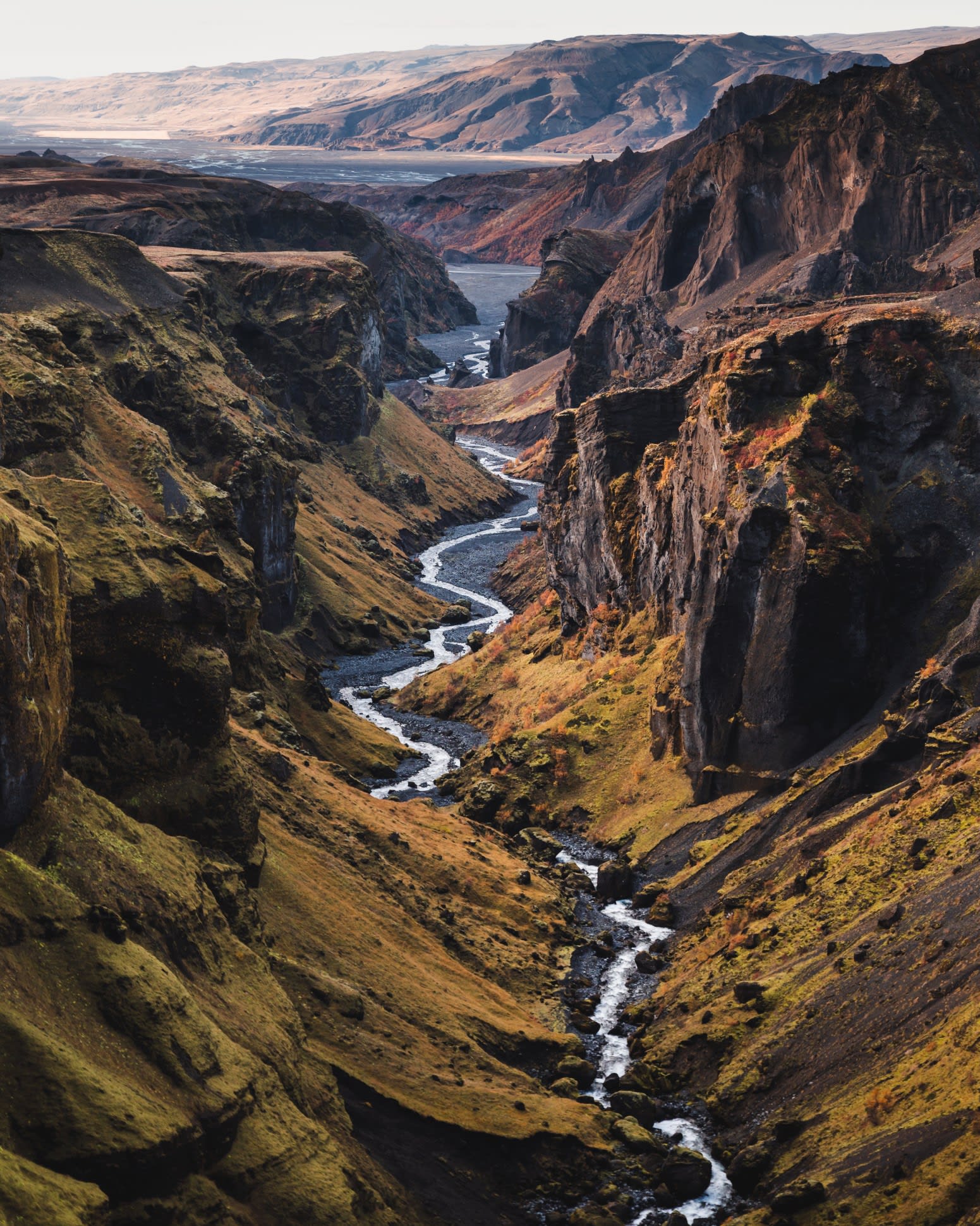 Thorsmork valley viewed from a the top of Hvannargil with views of mountains and glacier rivers