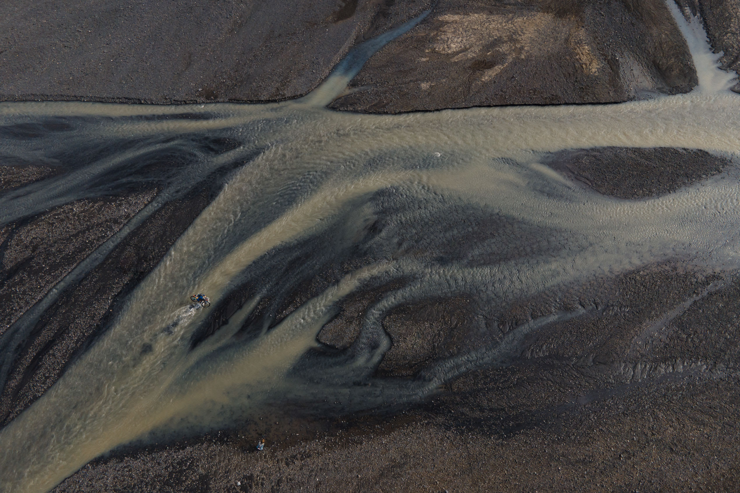 an aerial view of glacier rivers in Iceland