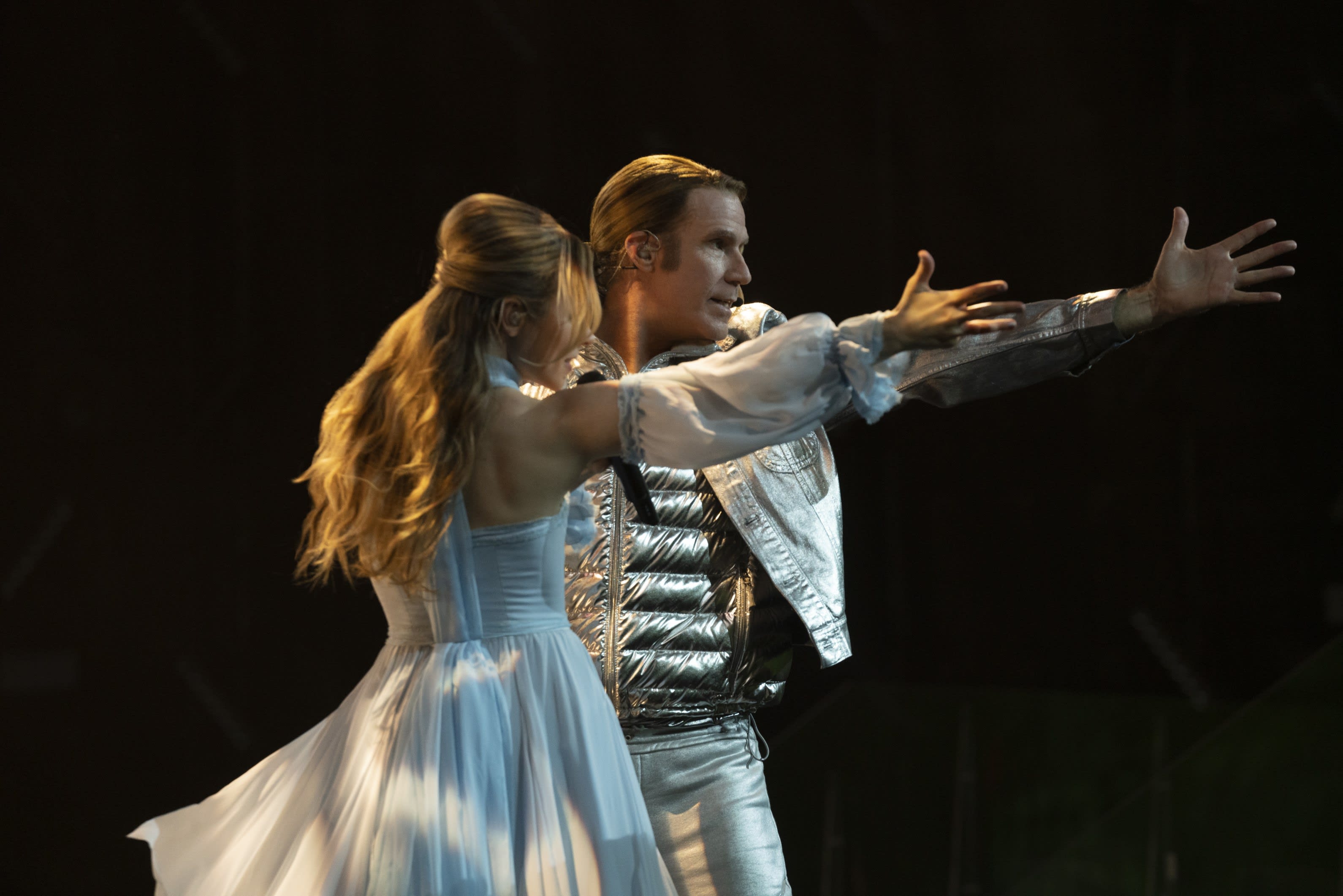 Will Ferrell and Rachel McAdams dancing on stage at Eurovision while they sing together