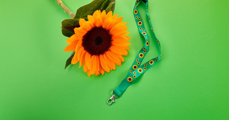 an image of a sunflower accompanied by the sunflower lanyard