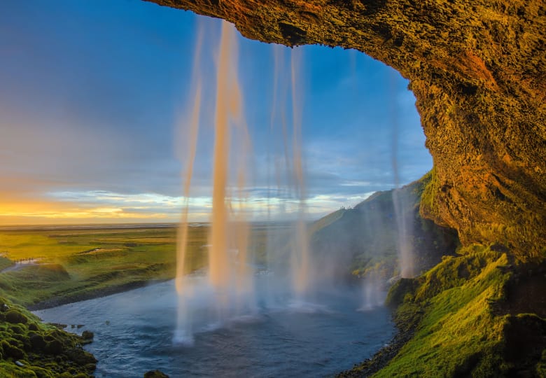 Image from behind Seljalandsfoss waterfall